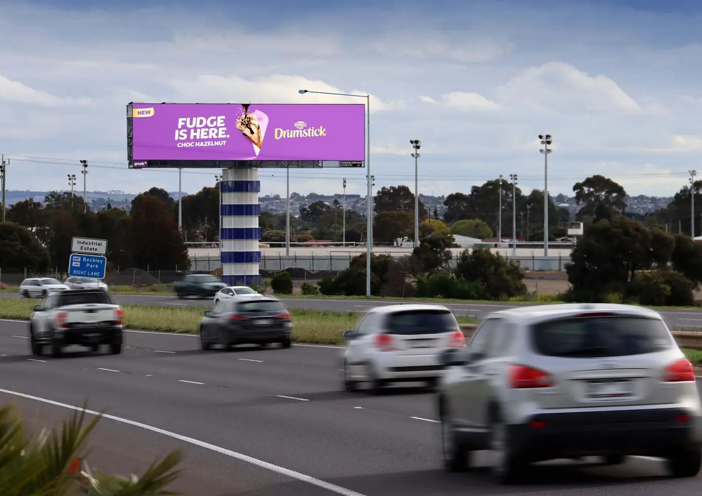 Gawk digital billboard displaying a summer campaign in Geelong